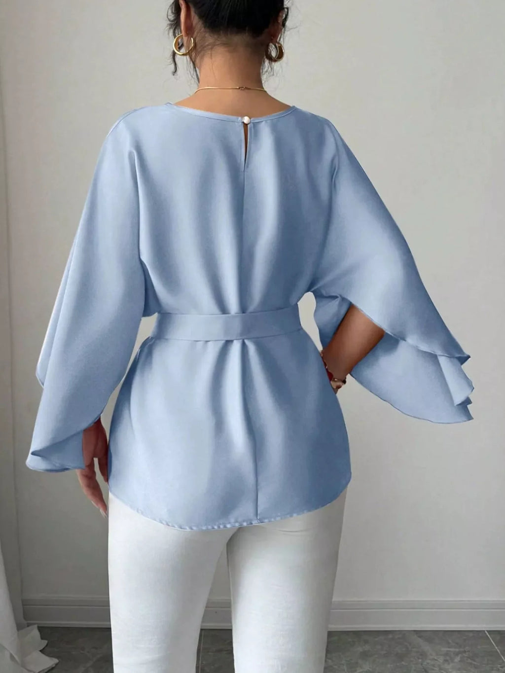 Shopimist batwing sleeve belted blouse featuring a flowy design and stylish belt, shown on a model with a modern, chic look.