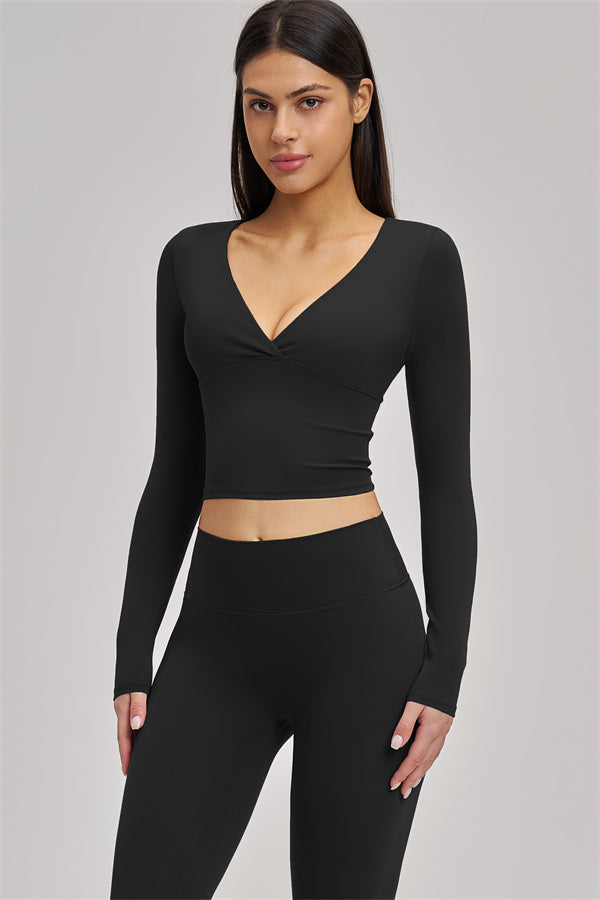 Fitglutes Activewear long sleeve crop top from The Swoon collection, featuring a fitted design and stylish athletic look.