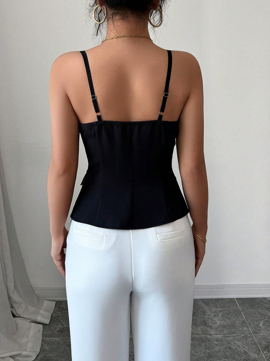 Women's fitted button-front cami tank top with sleeveless V-neck design, perfect for summer, by Trendsi.