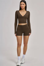 Fitglutes Activewear long sleeve crop top from The Swoon collection, shown in a stylish beige color with a fitted design.