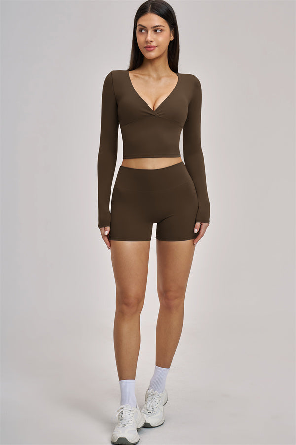 Fitglutes Activewear long sleeve crop top from The Swoon collection, shown in a stylish beige color with a fitted design.
