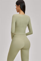 Fitglutes Activewear long sleeve crop top from The Swoon collection, shown in a stylish, fitted design perfect for gym and workout sessions.
