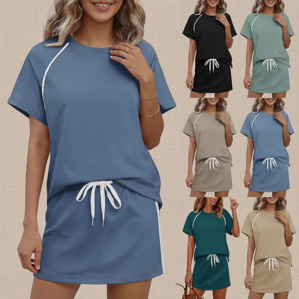 Women's FitiqueFit drawstring short-sleeve top and mini skirt set, casual summer outfit, featuring a lightweight fabric and relaxed fit.