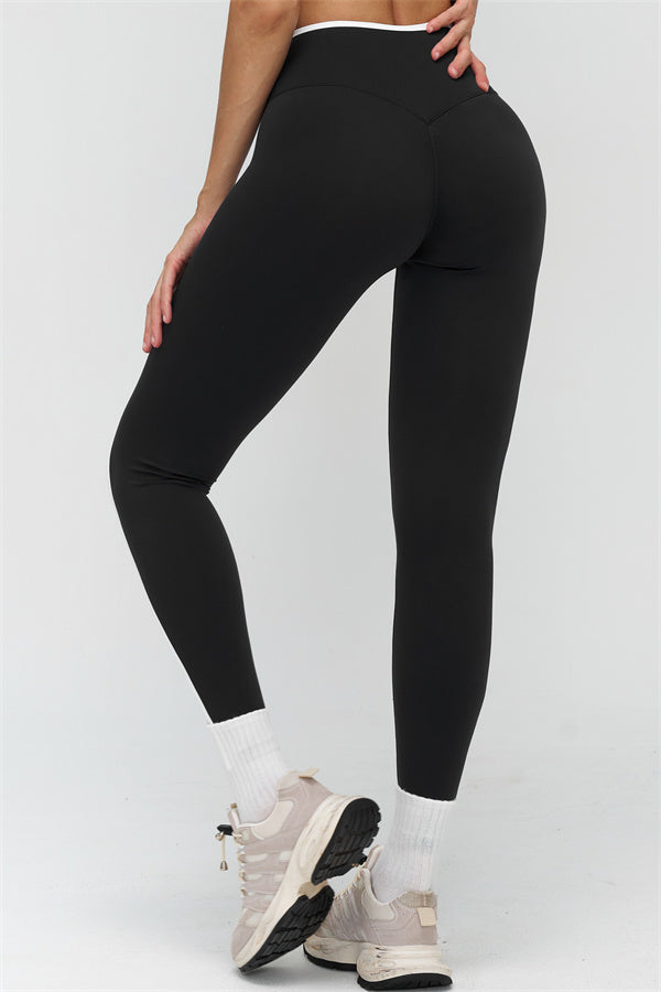 Fitglutes Activewear 2-piece sports bra and leggings set featuring a contrasting design, ideal for gym and workout sessions.