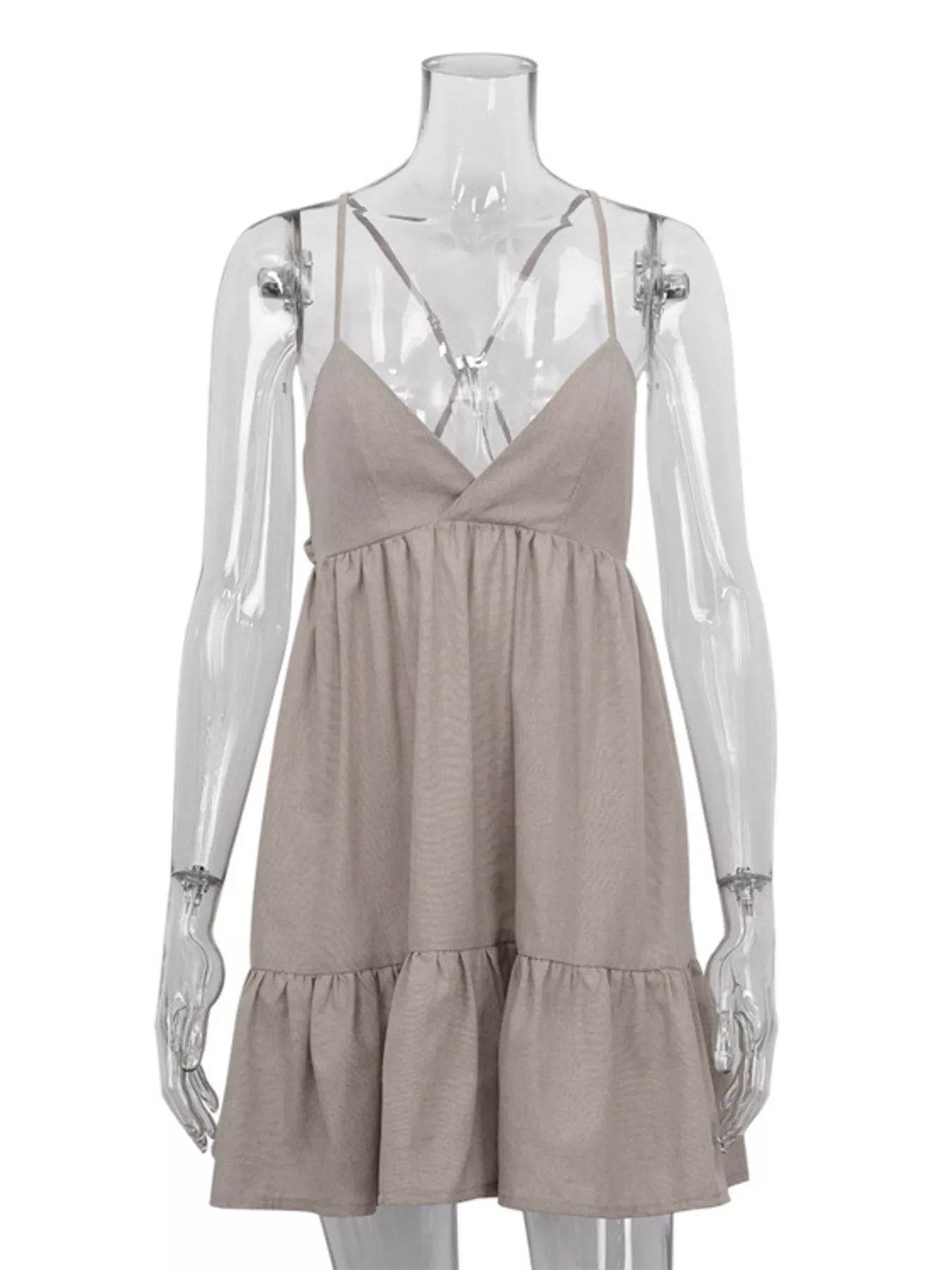 Backless spaghetti strap mini dress by Shopimist, featuring a sleek design and lightweight fabric, perfect for summer or evening wear.