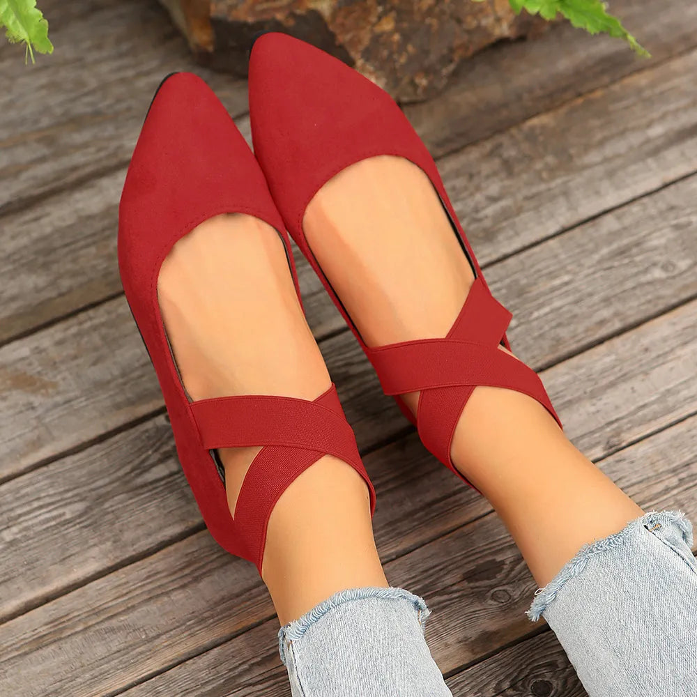 Women's crisscross point toe flat slip-ons by Trendsi, showcasing stylish black flats with a sleek design and comfortable fit.