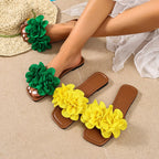 Floral-embellished flat sandals by Plush Fashion Hub featuring colorful floral details and comfortable flat design.