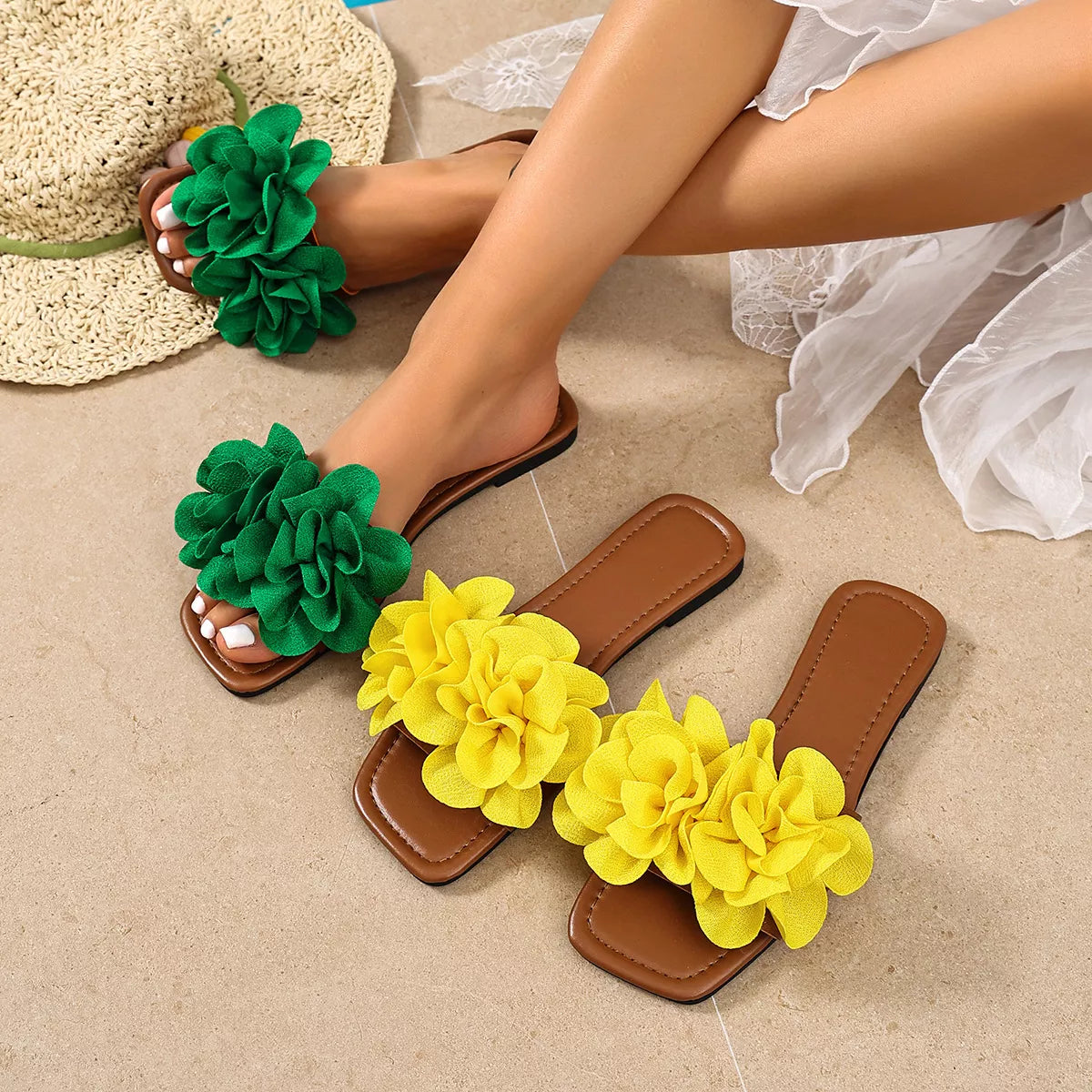 Floral-embellished flat sandals by Plush Fashion Hub featuring colorful floral details and comfortable flat design.