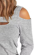 Women's elegant cold shoulder blouse by Trendsi featuring cutout details and a chic casual polyester top design.