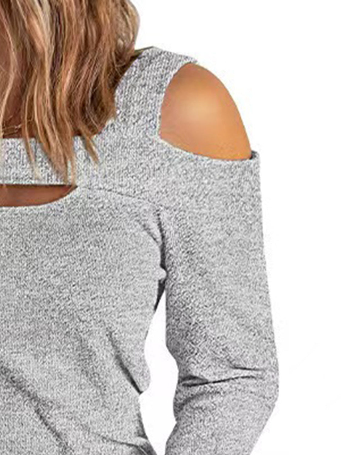 Women's elegant cold shoulder blouse by Trendsi featuring cutout details and a chic casual polyester top design.
