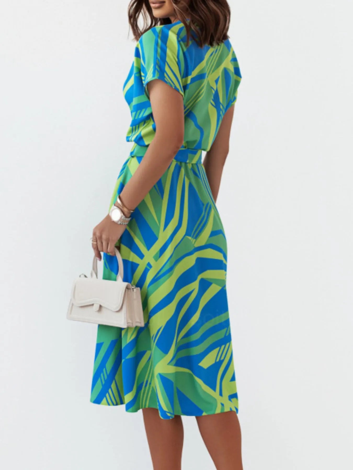 Printed button front midi dress with belt by Plush Fashion Hub, featuring a stylish design and casual elegance.