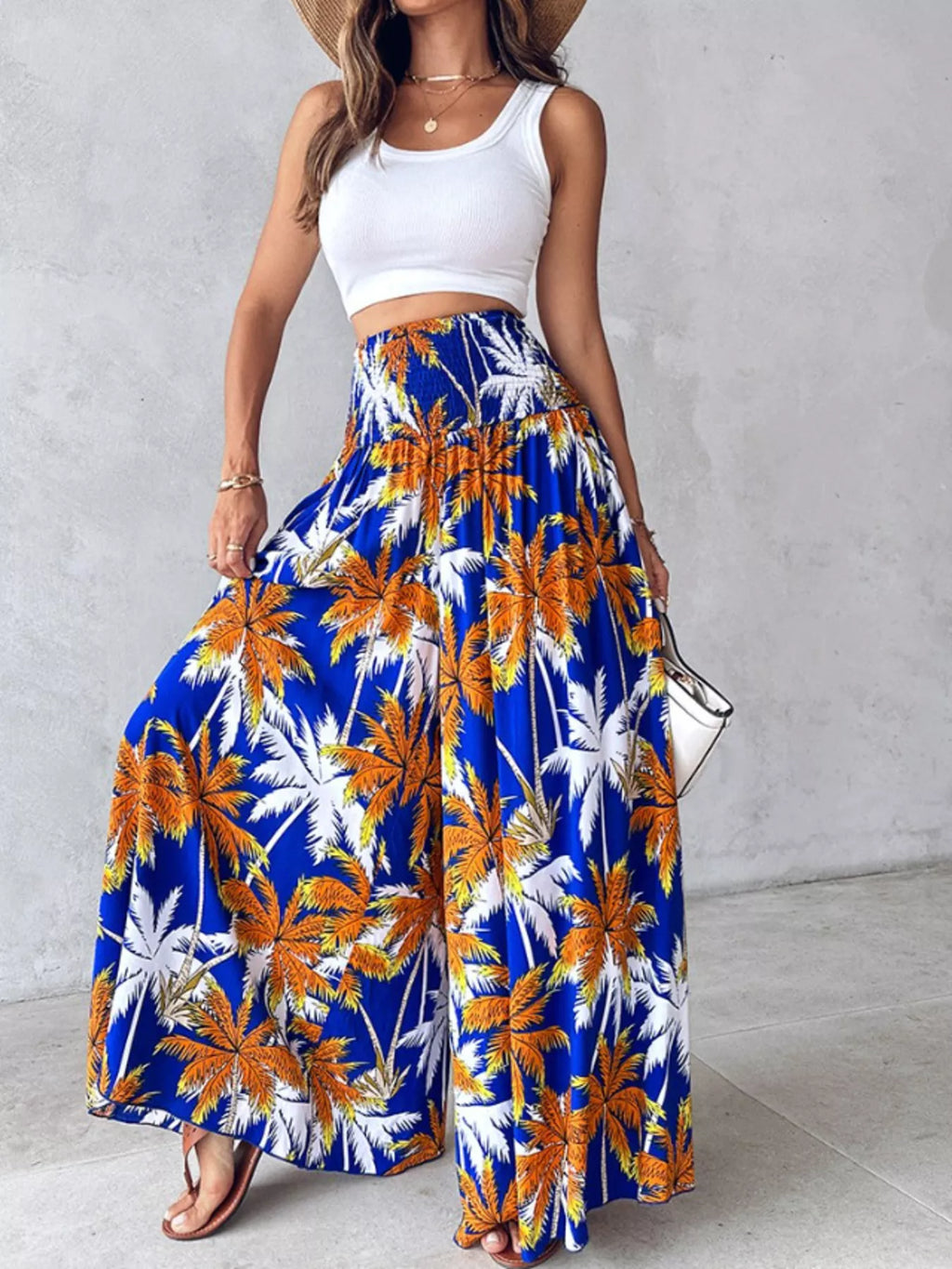 Printed wide-leg pants by Shopimist featuring a flowy design and vibrant pattern, shown on a model.