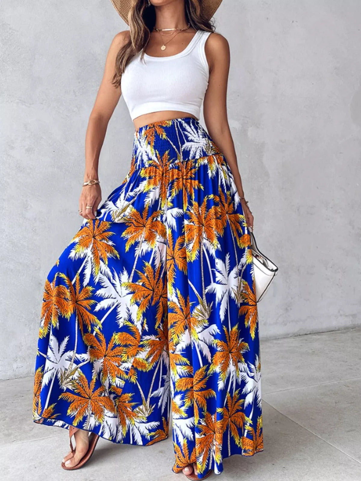 Printed wide-leg pants from Plush Fashion Hub featuring vibrant floral patterns and a relaxed, flowing fit.
