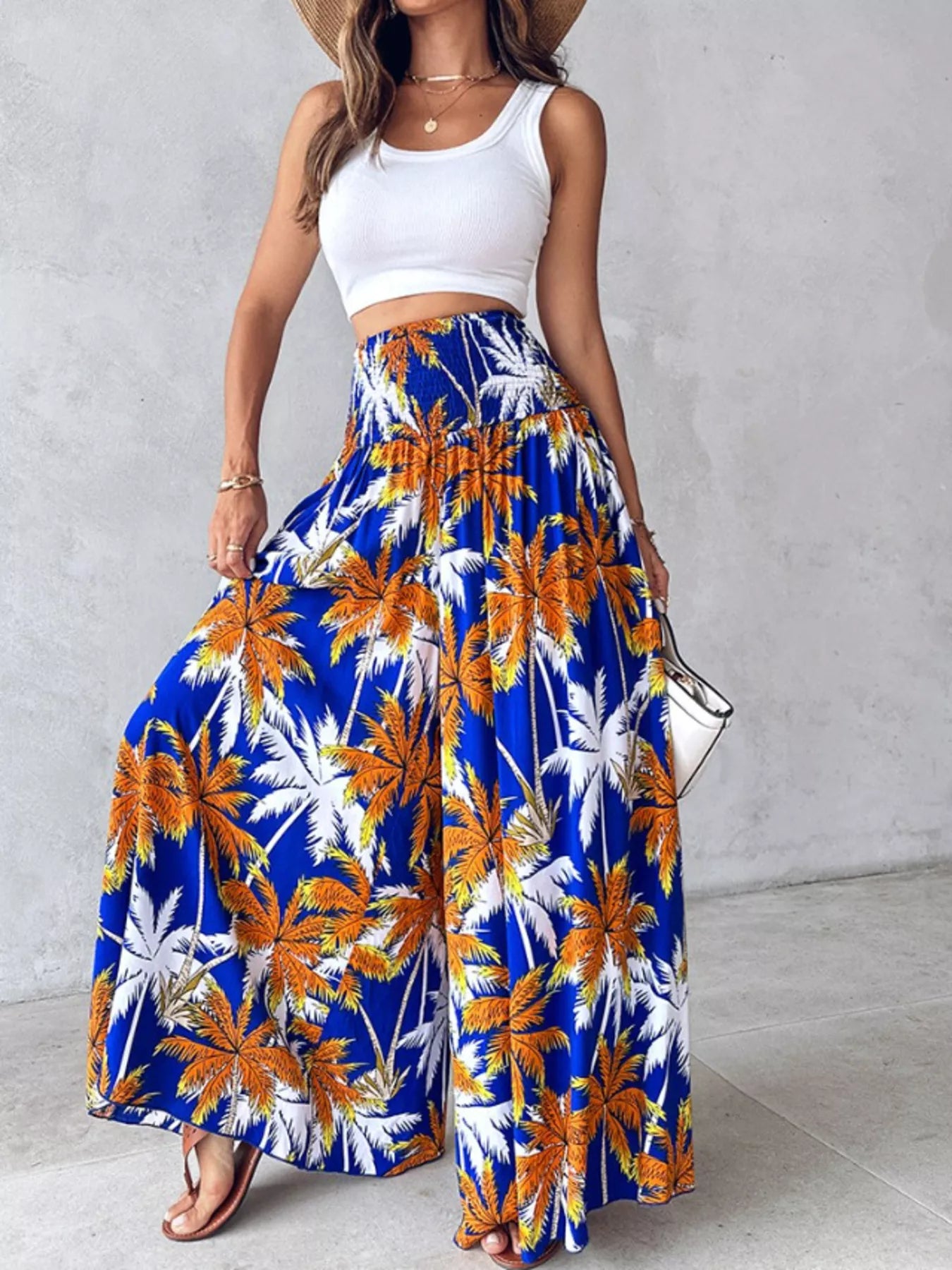 Printed wide-leg pants by Shopimist featuring a flowy design and vibrant pattern, shown on a model.