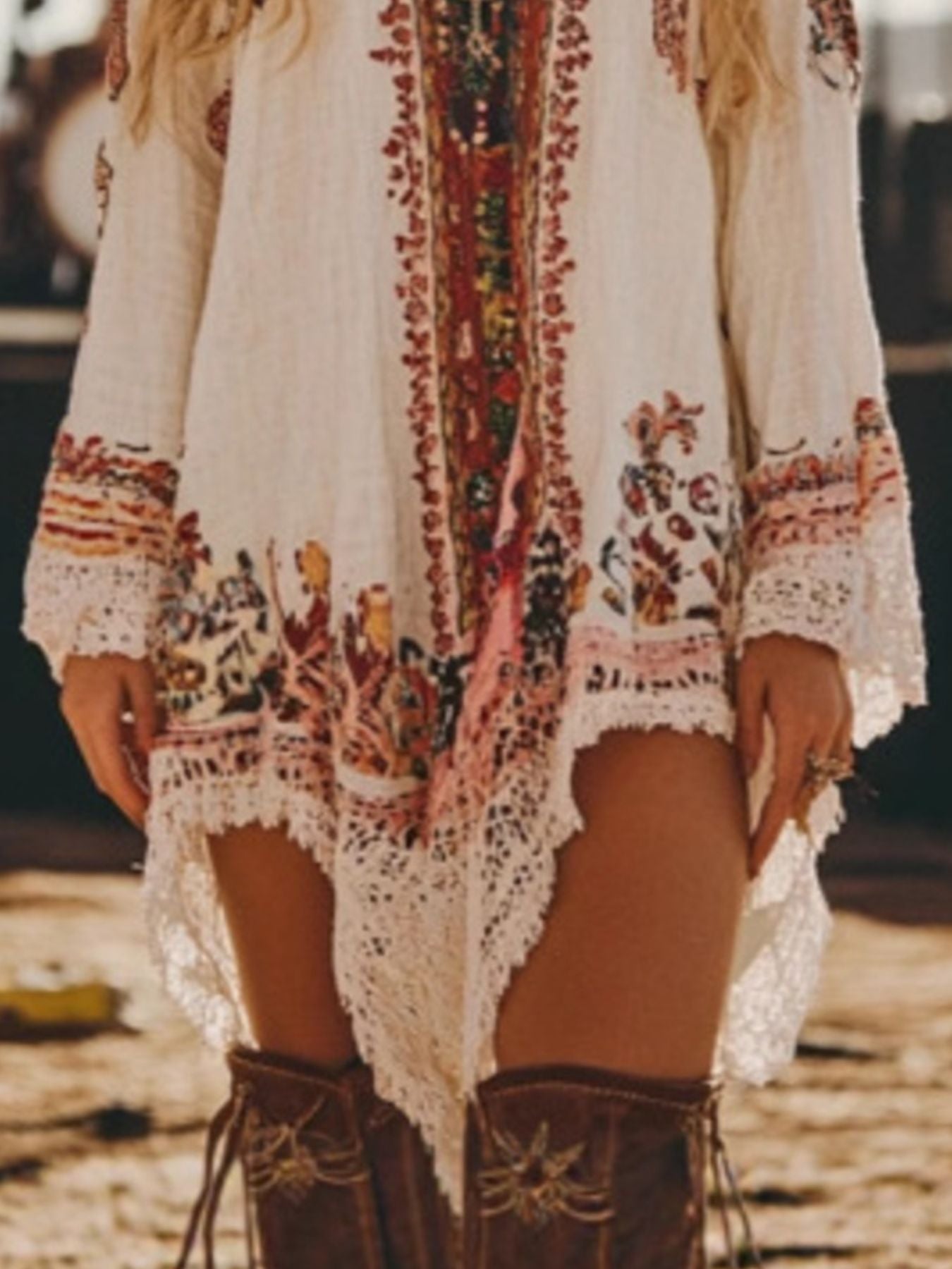 Elegant long sleeve lace trim mini dress by Trendsi, featuring romantic design, perfect for cocktail and daywear occasions.