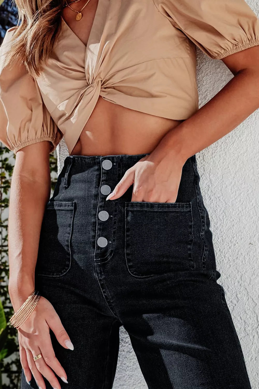 High-waisted button-fly wide-leg jeans from Trendsi, featuring classic denim with front pockets and a relaxed fit.