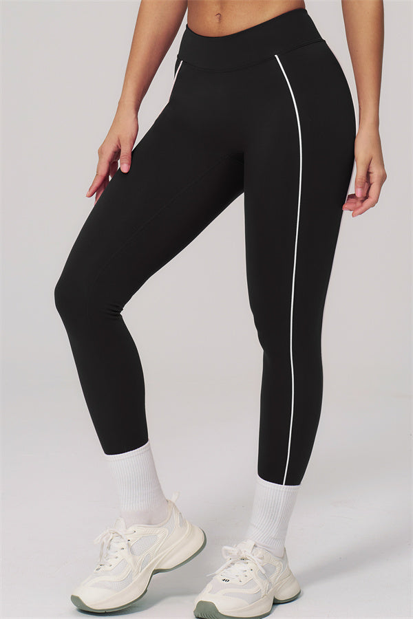 Fitglutes Activewear sports bra and leggings set featuring contour line design, shown on a model for workout and gym wear.