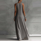 Off-shoulder color-block flared maxi dress with pockets by FitiqueFit, shown in vibrant multi-color design.