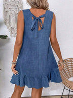 Women's ruffle lace-up mini dress by Plush Fashion Hub featuring short sleeves and a loose, beach-ready design.