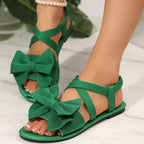 Shopimist bow embellished flat sandals with feminine bow details and sleek design, perfect for casual and summer wear.