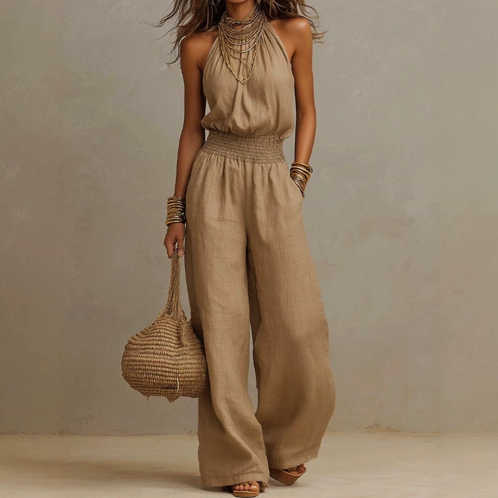 Women's solid color halter-neck backless wide-leg jumpsuit by Plush Fashion Hub, featuring a stylish streetwear look.