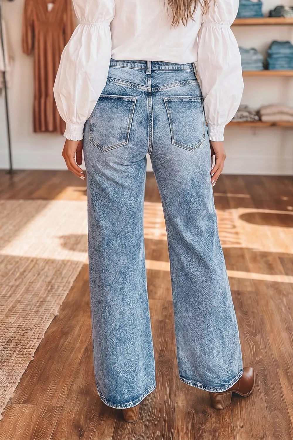 Acid wash flare jeans with pocket details by Shopimist, showing the distressed denim style and high-waist fit.