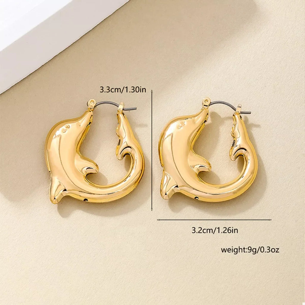 18K gold-plated dolphin hoop earrings with detailed dolphin design, shiny finish, and secure hoop closure.