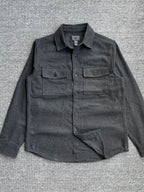 Men's Shopimist button-up long sleeve shacket with a casual fit, featuring a plaid pattern and front button closures.