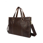 First layer oily cowhide leather shoulder messenger bag with adjustable strap and classic design by Plush Fashion Hub.