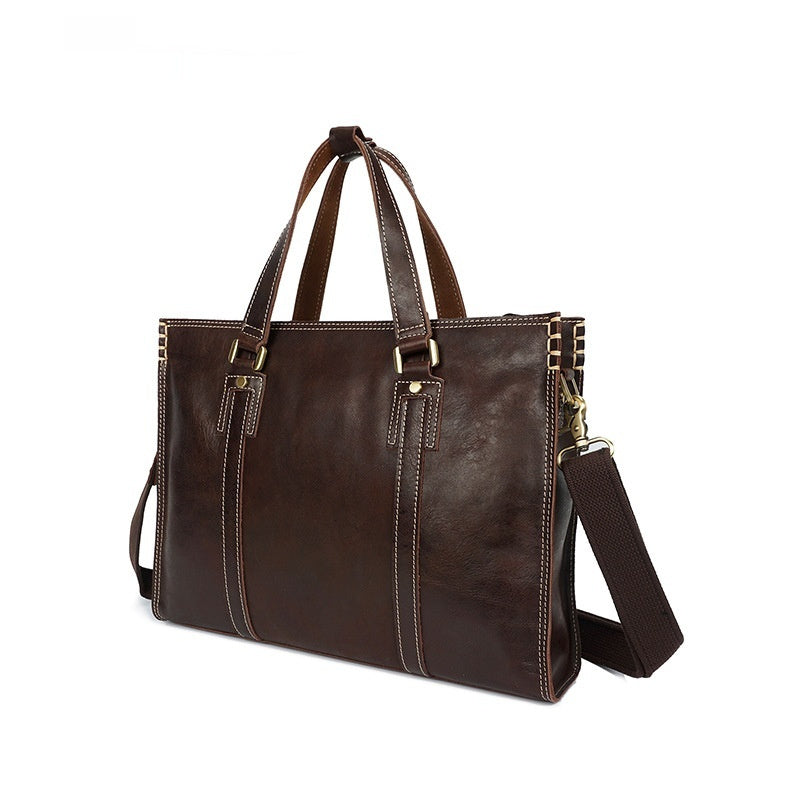 First layer oily cowhide leather shoulder messenger bag with adjustable strap and classic design by Plush Fashion Hub.