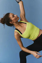 Scoop neck active tank top in black from Trendsi, made of lightweight, breathable fabric for workout and casual wear.