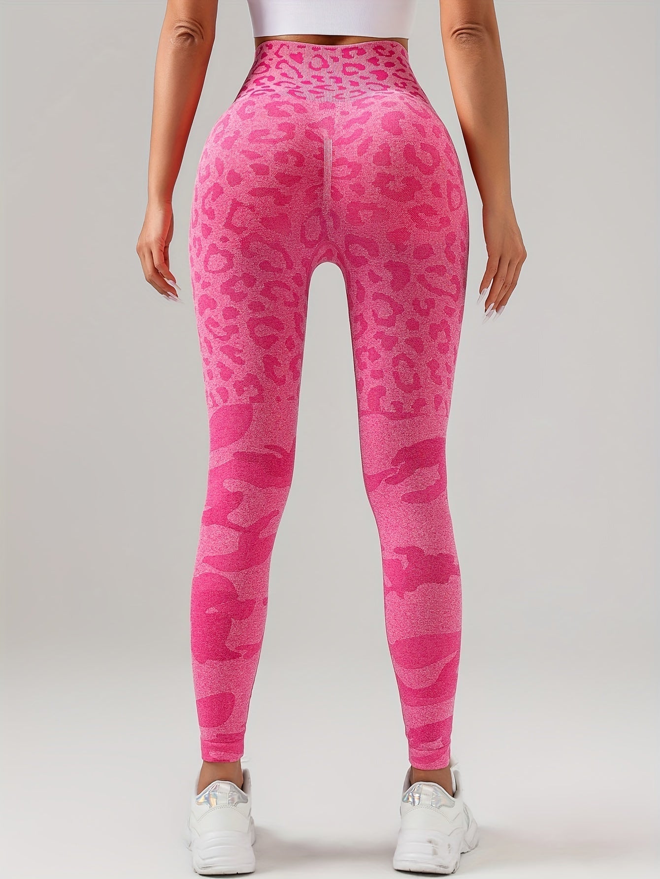 Women’s seamless sports leggings by FitiqueFit, shown in black, featuring high-waist design and stretchy, comfortable activewear fabric.