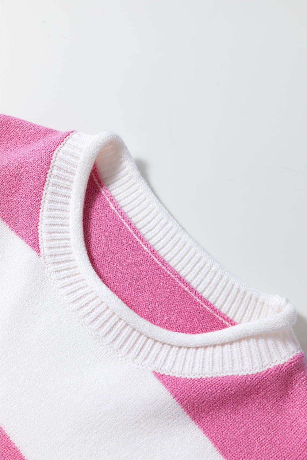 Lightweight knitted summer short sleeve sweater by Threaded Pear, showing a soft, breathable fabric in a casual style.