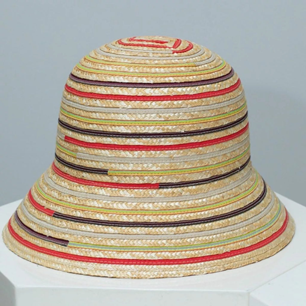 Striped straw bucket hat by Plush Fashion Hub, lightweight summer sun hat for women with a casual, stylish design.