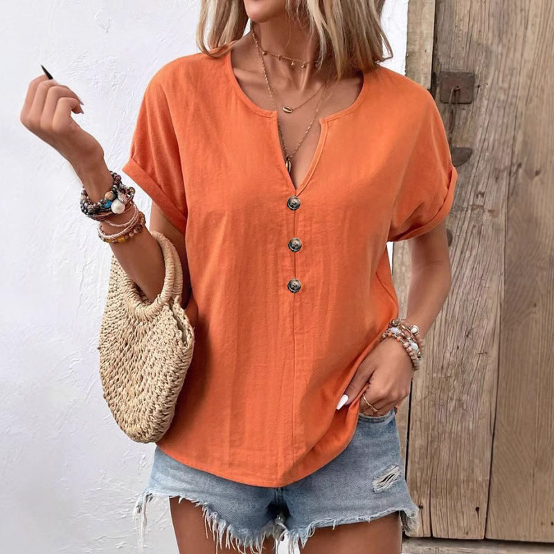 Women's buttoned V-neck short-sleeve T-shirt top by Plush Fashion Hub, featuring a casual fit and classic design.