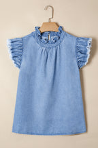 Women's distressed denim top by Trendsi with frilled collar and flutter sleeves, shown in a stylish casual fit.