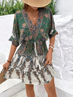 Paisley print batwing sleeve tassel tie front ruffle hem casual dress by Plush Fashion Hub, featuring flowing fabric and bohemian style.