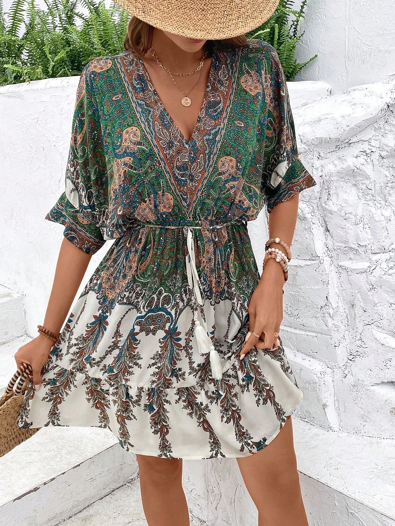 Paisley print batwing sleeve tassel tie front ruffle hem casual dress by Plush Fashion Hub, featuring flowing fabric and bohemian style.