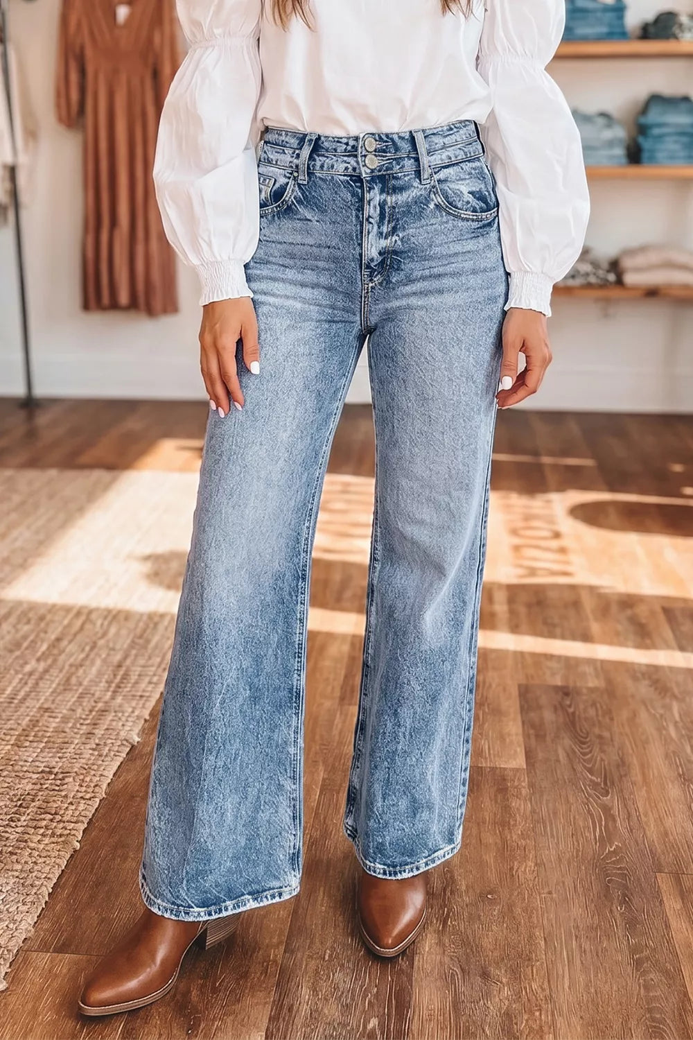 Acid wash flare jeans with pocket details from Shopimist, showing the distressed fabric and stylish fit.