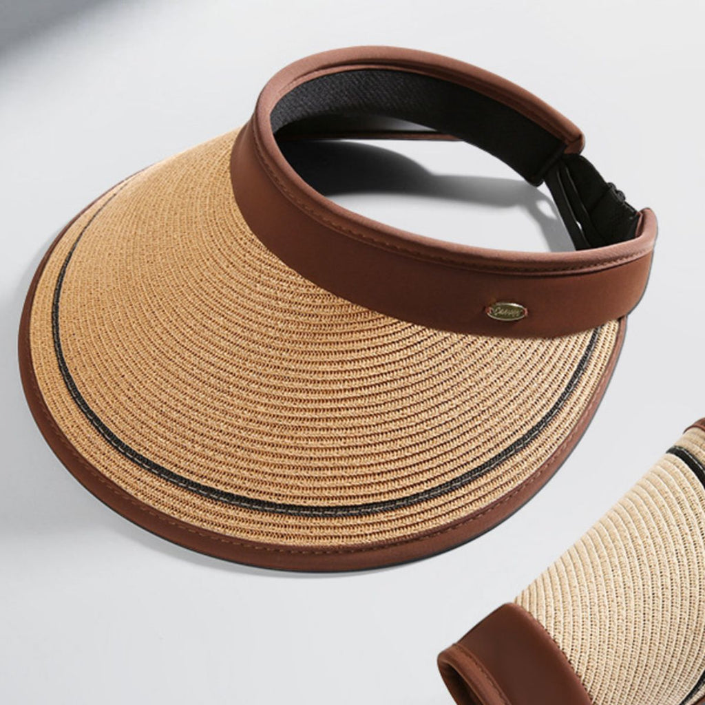 Women's wide brim straw visor hat by Trendsi, breathable UV sun protection accessory, featuring a large brim and lightweight straw material.