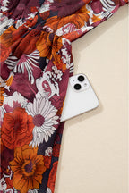 Flowy mini dress by Threaded Pear with floral print, featuring Marianna sleeve design and lightweight fabric.