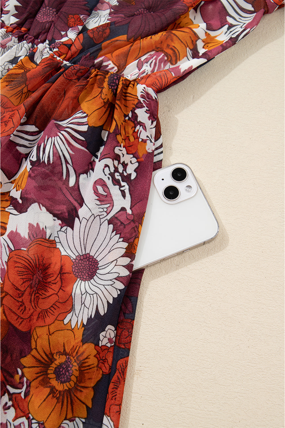 Flowy mini dress by Threaded Pear with floral print, featuring Marianna sleeve design and lightweight fabric.