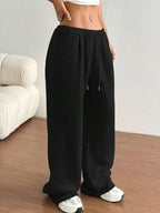 Simple Love casual high waist wide-leg sweatpants with drawstring, shown in a relaxed fit with rings detail.