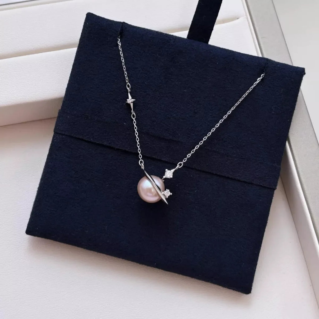 Planet Pearl Pendant Necklace by Shopimist featuring a luminous pearl pendant on a delicate chain.