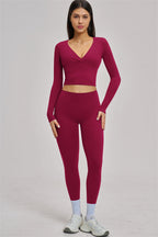 Fitglutes Activewear long sleeve crop top with a fitted design, perfect for gym and workout sessions.