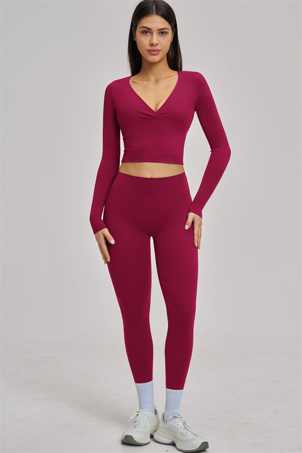 Fitglutes Activewear long sleeve crop top with a fitted design, perfect for gym and workout sessions.