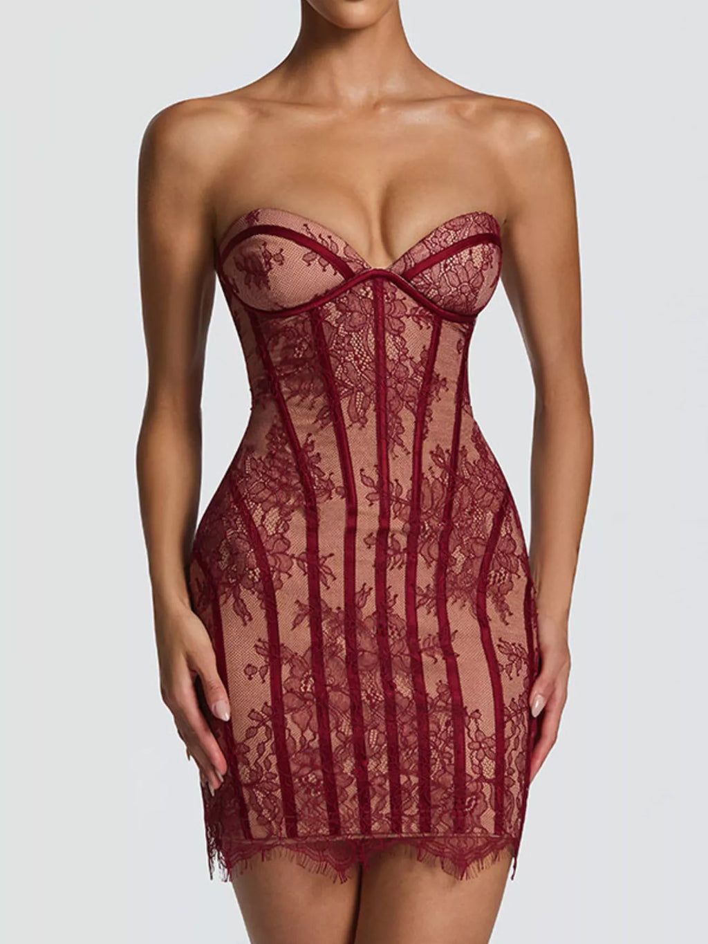 Lace detail tube mini dress from Trendsi featuring a fitted silhouette and elegant design, displayed on a hanger.