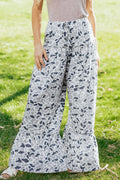 Light beige Hope Wide Leg Casual Pants from Threaded Pear, featuring a relaxed fit and flowy silhouette.