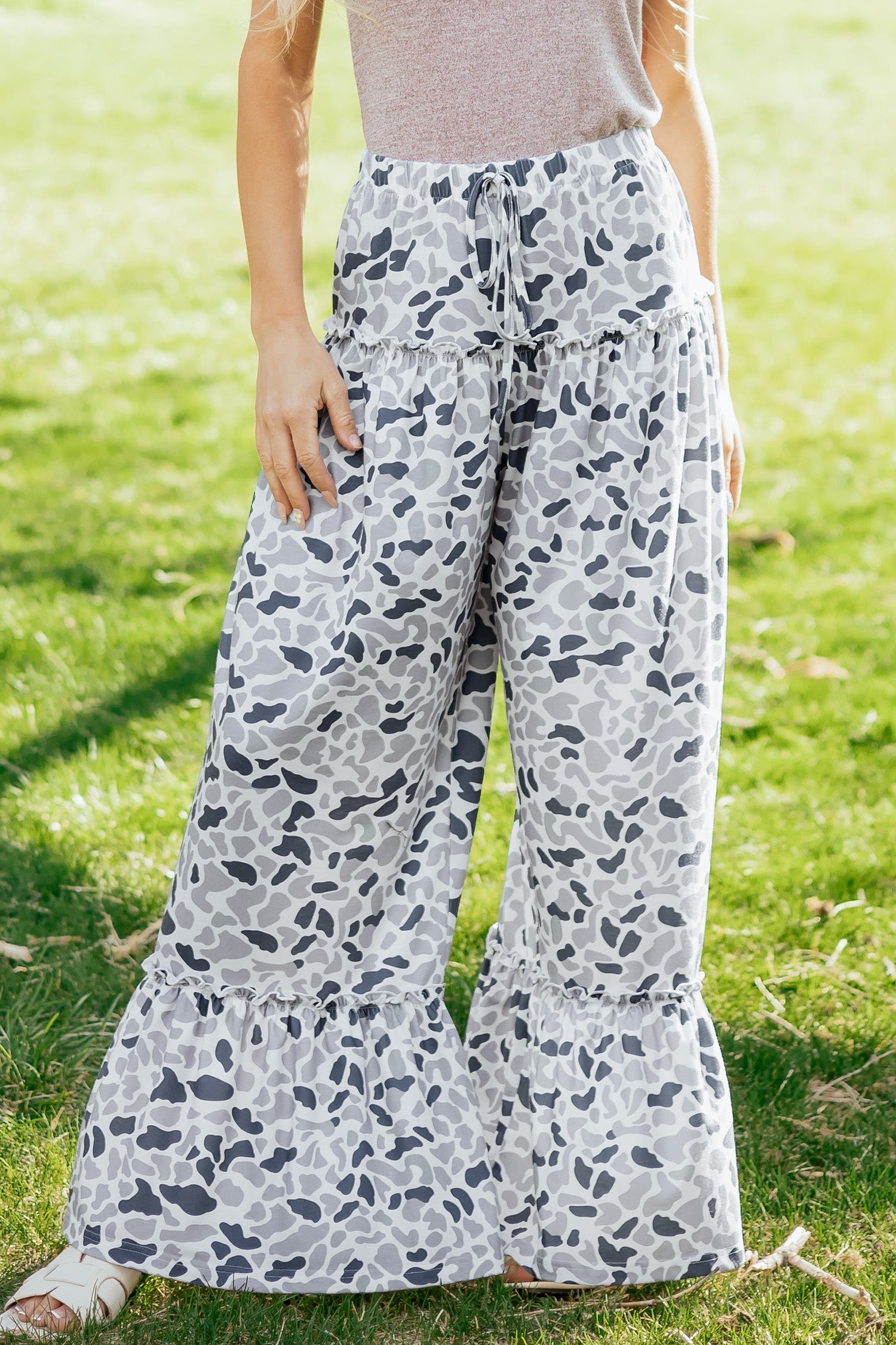 Light beige Hope Wide Leg Casual Pants from Threaded Pear, featuring a relaxed fit and flowy silhouette.