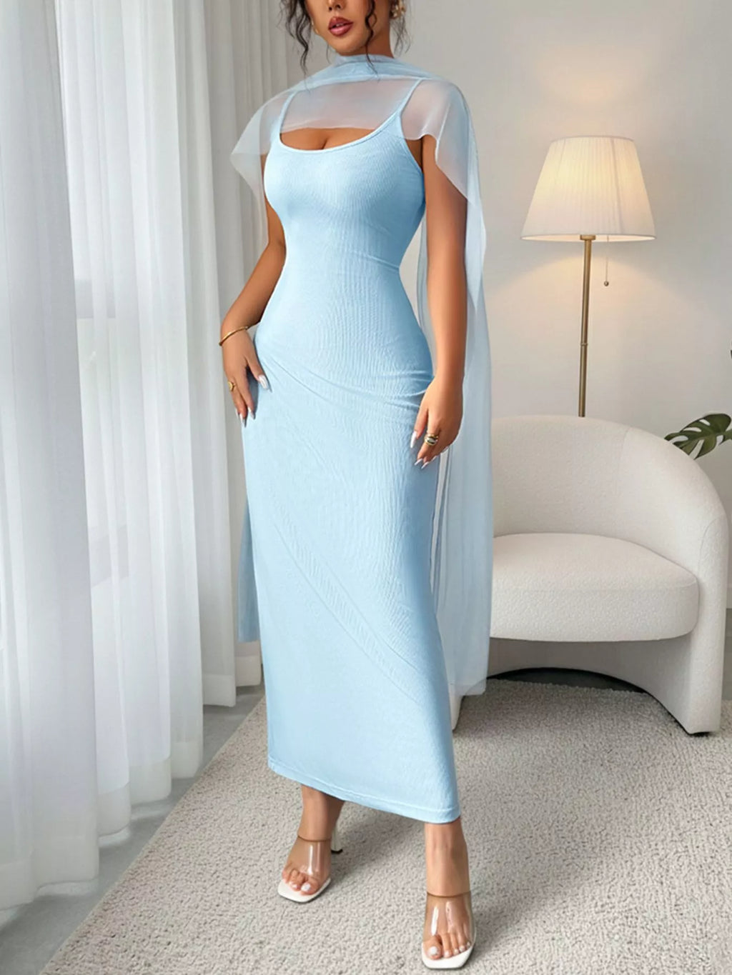 Women's ribbed scoop neck bodycon maxi dress by Trendsi, elegant stretch floor-length dress with a fitted silhouette and scoop neckline.
